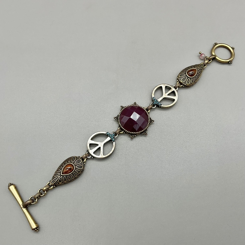 Lucky Brand Bracelet Peace Sign Burgundy Red Stone Mixed Metal Boho Toggle 8"